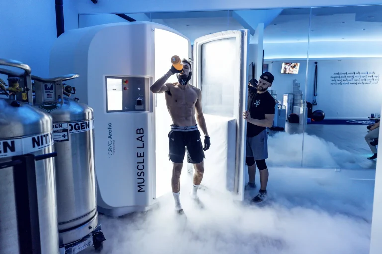 person-exiting-muscle-lab-cryotherapy-chamber